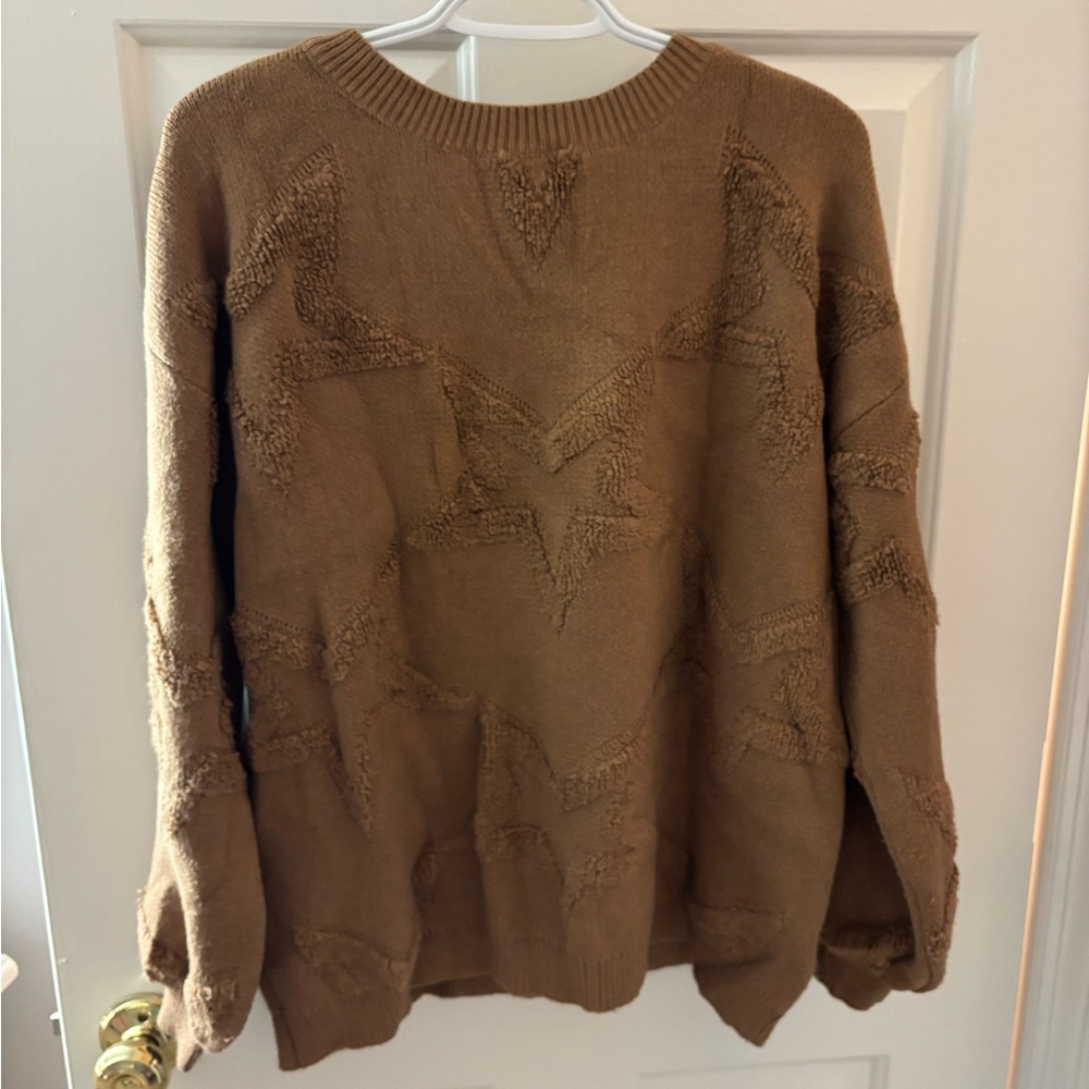 Women’s brown star sweater size S/M